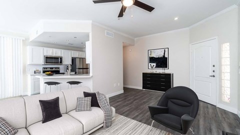 a living room with a couch and a chair